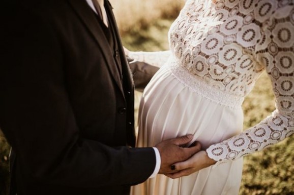 Wedding dress for pregnant bride